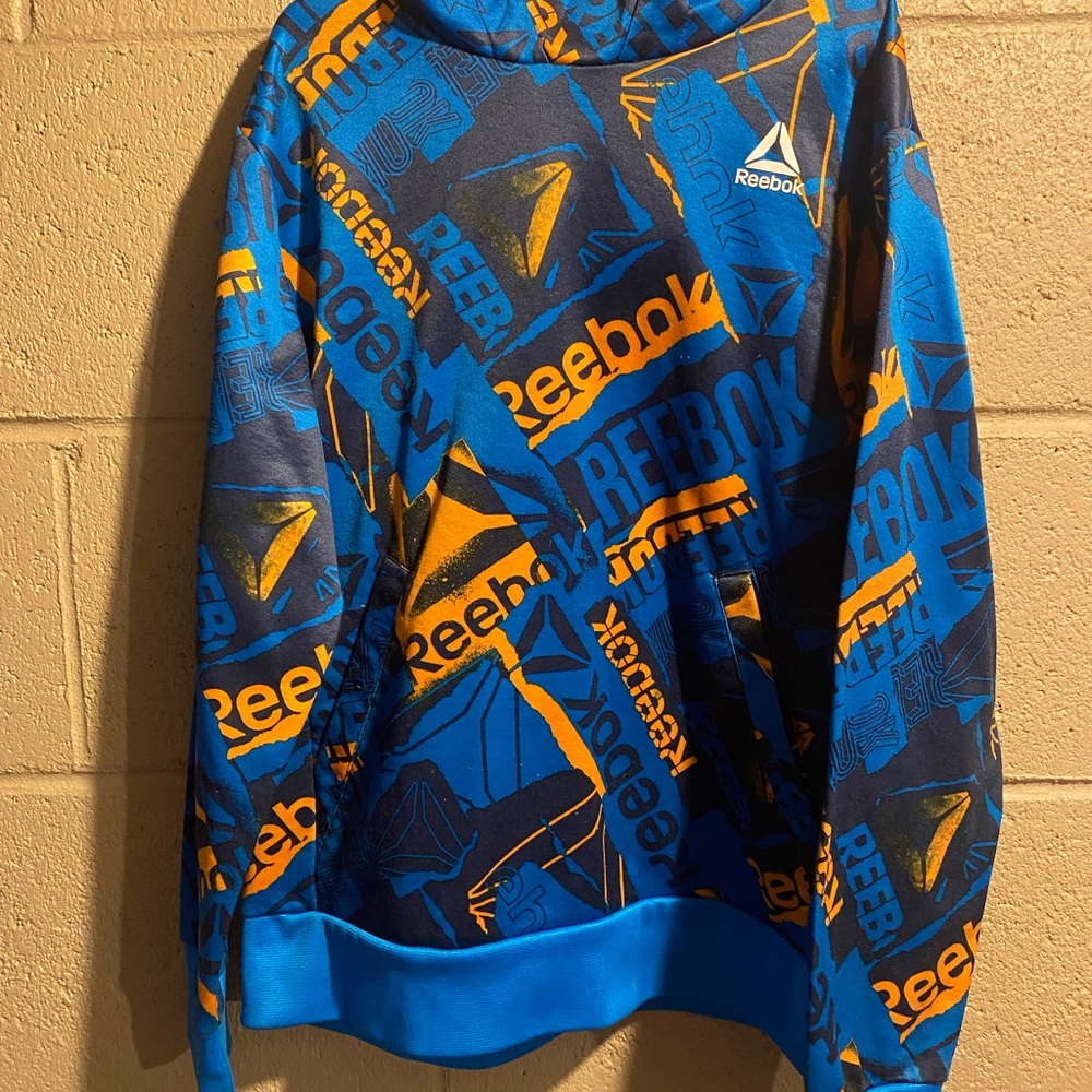 Reebok Boys Hoodie Vibrant Blue & Orange Collage Front Pocket Youth Large 10/12